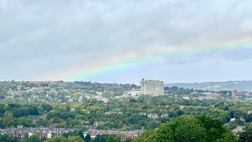 Sheffield view with the Royal Hallamshire Hospital in the middle under a rainbow